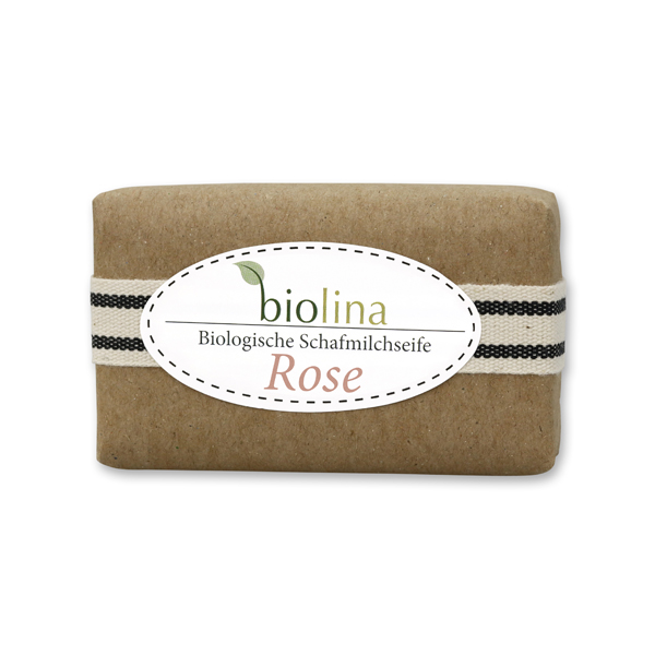 Biolina Schafmilchseife 100g verpackt mit braunem Papier und Dekoband gestreift, Rose 