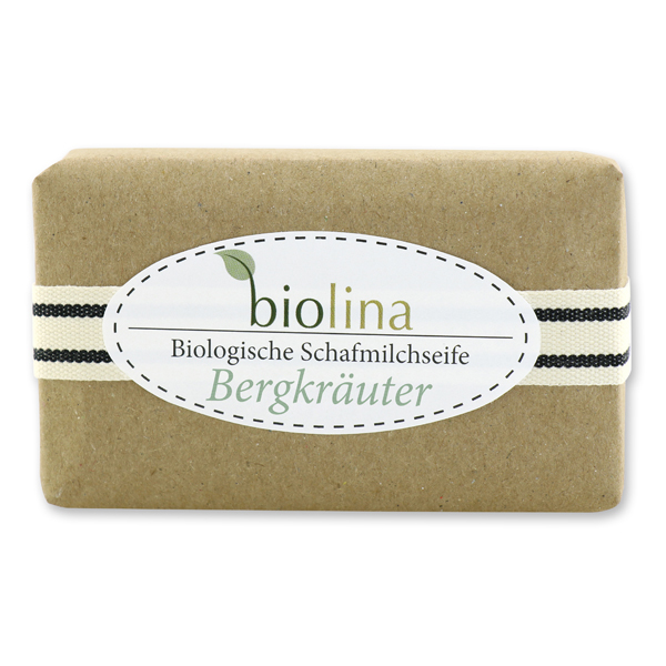 Biolina Schafmilchseife 200g verpackt mit braunem Papier und Dekoband gestreift, Bergkräuter 