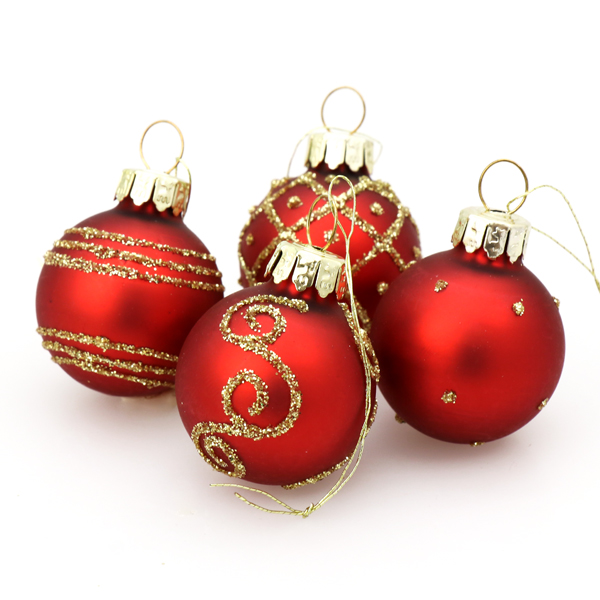 Red bauble with a golden painting 