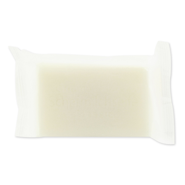 Sheep milk soap square 100g in a flowpack packaging in a milky parchment paper, 