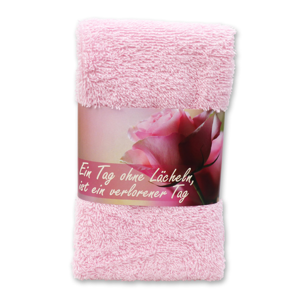 Gästehandtuch 30x50cm "Ein Tag ohne Lächeln, ist ein verlorener Tag", rosa 