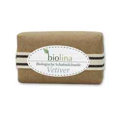 Biolina Schafmilchseife 100g verpackt mit braunem Papier und Dekoband gestreift, Vetiver 